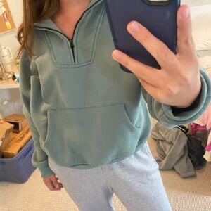 green blue quarter zip